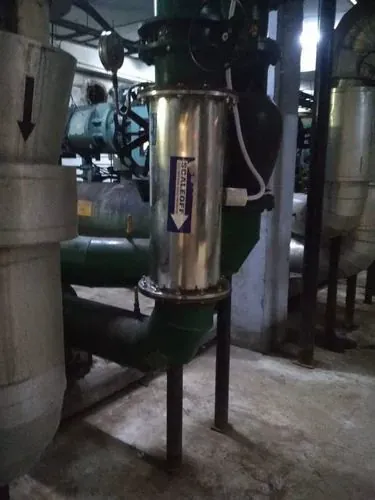 Stainless steel ScaleOff scale preventer installed in a chiller plant room pipeline