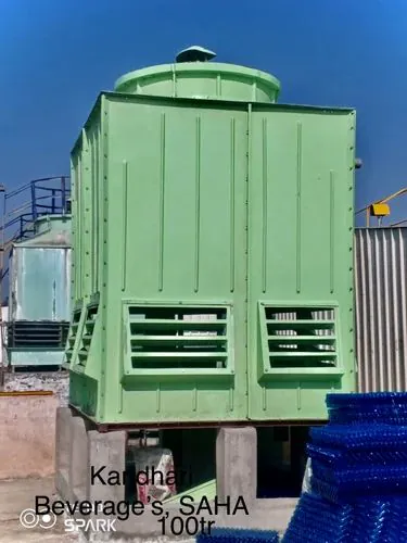 Green FRP square type cooling tower rated 100 TR at the Kandhari Beverages bottling plant in Saha